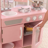 KidKraft Vintage Wooden Play Kitchen – Pink Retro Design, Working Knobs & Toy Phone