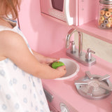 KidKraft Vintage Wooden Play Kitchen – Pink Retro Design, Working Knobs & Toy Phone