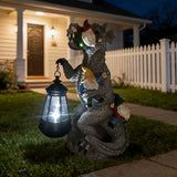 12.3" Solar Dinosaur Eating Gnomes Garden Statue, Sculpture with LED Lantern