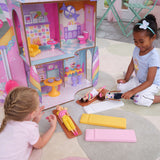 KidKraft Candy Castle Wooden Dollhouse – 3 Levels, Working Elevator & 28 Accessories