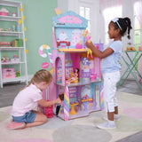 KidKraft Candy Castle Wooden Dollhouse – 3 Levels, Working Elevator & 28 Accessories