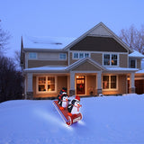 Mr. Christmas 38" Animated Outdoor Sledding Penguins with Chasing Lights & 6-Hour Timer