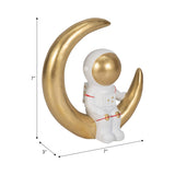 Astronaut on Crescent Moon Figurine, Approximately 8", White & Gold Resin Tabletop Décor
