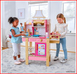 KidKraft Cook with Barbie Wooden Play Kitchen – Light-Up Oven, Sounds, Water-Reveal Food & 30 Accessories