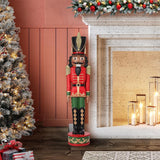 Haute Decor 37" Red and Green Christmas Nutcracker Resin Statue with Hand-Carved Wood Look