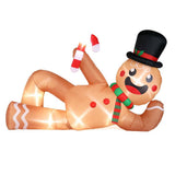 9.8 ft. Long Pre-Lit Lying Gingerbread Man Christmas Inflatable with LED Lights