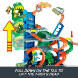 Hot Wheels City Ultimate T-Rex Garage Playset with 2 Die-Cast Cars and Storage