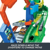 Hot Wheels City Ultimate T-Rex Garage Playset with 2 Die-Cast Cars and Storage
