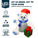 4 ft. Waving Polar Bear Christmas Inflatable with Swirling LED Lights