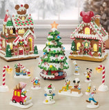 Disney Illuminated Musical Christmas Village with Building & Lit Tree, 13-Piece Set