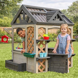 KidKraft Garden & Grow Outdoor Wooden Greenhouse Playhouse with Kitchen, Planter