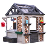 KidKraft Garden & Grow Outdoor Wooden Greenhouse Playhouse with Kitchen, Planter