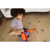 Hot Wheels City Speed Drop Transport Hauler with 1 Toy Car, Stores 20+ 1:64 Scal