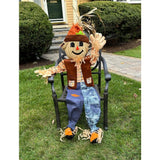 Worth Imports 60" Life-Size Sitting Scarecrow with Poseable Arms and Legs