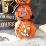 14.25 in. H Halloween Lighted Stacked Resin Pumpkin Table Decor